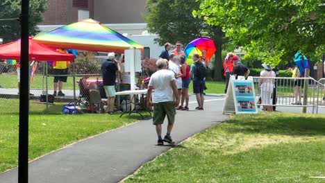 Slow-motion-shot-of-many-people-in-with-rainbow-colors-at-pride-festival-during-summer-day-in-america