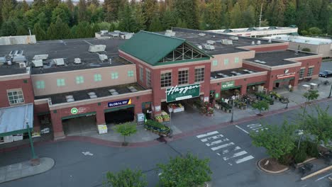 Aerial-view-pulling-away-from-a-Haggen-grocery-store-in-Washington-State