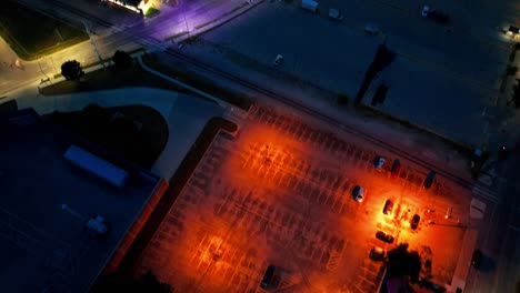 Downtown-Des-Moines,-Iowa-buildings-at-sunset-with-drone-video-tilting-up-and-moving-in