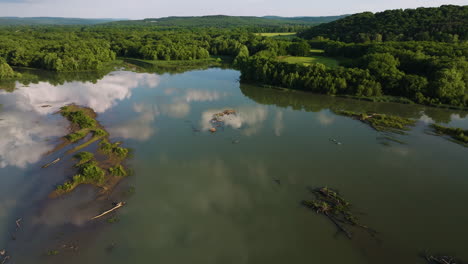 Sky-Reflecting-On-The-Calm-Waters-Of-Lake-Sequoyah-In-Arkansas,USA---aerial-drone-shot