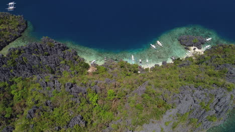 Aerial-over-the-rugged-cliffs-of-Palawan,-Philippines