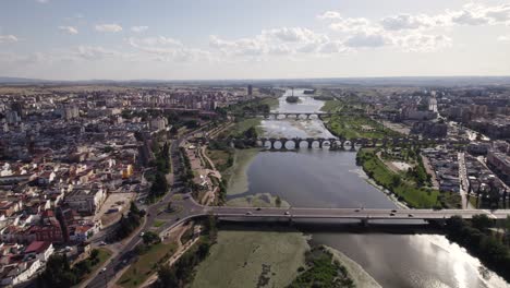 Aerial-panoramic-view-of-Badajoz-bridges-over-Guadiana-River,-Spain
