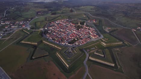 Wide-shot-of-Castle-Fortress-of-Almeida-Portugal-during-sunrise,-aerial