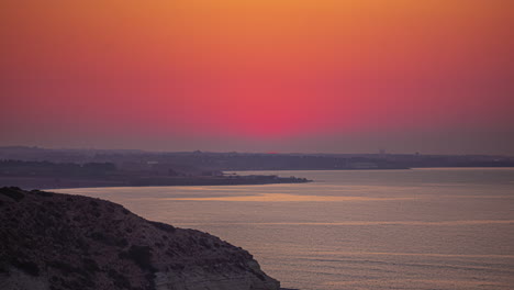Majestic-red-sunrise-of-Cyprus-island,-time-lapse-view