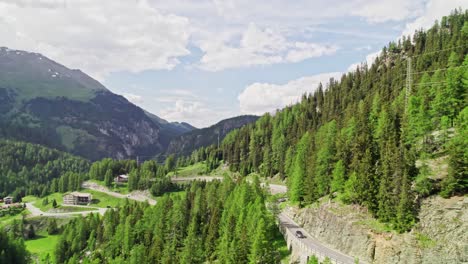 Forest-Valley-With-Winding-Road-Near-Marmorera,-Switzerland