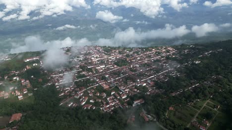 Aerial-view-of-Barichara-little-colonial-town-in-Santander-department-of-Colombia-on-the-edge-of-Colombian-mountains-andes-cliff-travel-holiday-destination