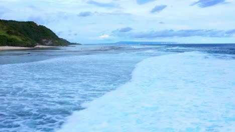 Idyllic-Seascape-Of-Gunung-Payung-Beach-In-Bali,-Indonesia---drone-shot
