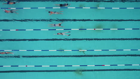 Gordon-salt-water-pool-with-visitors-swimming-in-it---Top-down-shot