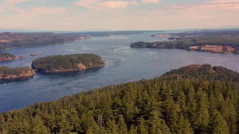 Soaring-Above-Treetops:-Drone-View-of-Ocean-Islands-with-Campbell-River-on-the-Horizon