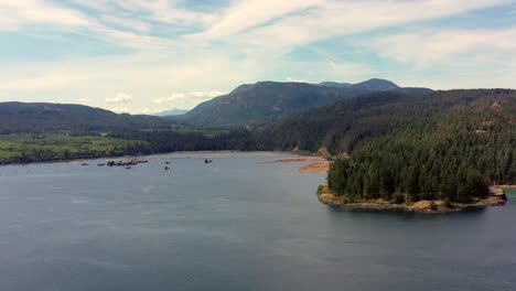 Inlet-Industry:-Drone-Footage-of-Tugboats-and-Floating-Wood-in-Campbell-River