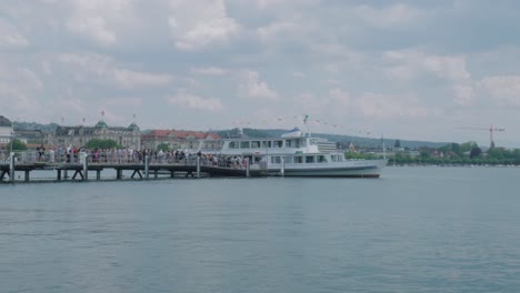 Slow-motion-footage-of-people-loading-onto-a-Ferry-boat
