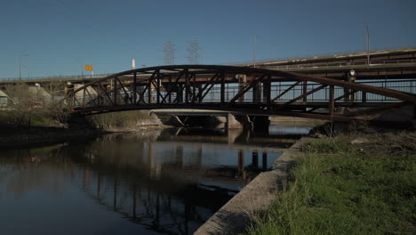 Joggers-and-cyclists-crossing-a-bridge-over-the-Don-River-in-Toronto