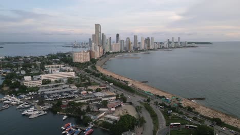 Aerial-View-of-Cartagena-Colombia,-Resort-City-on-Caribbean-Sea,-Coastal-Traffic-and-Modern-Buildings-on-Bocagrande,-Drone-Shot