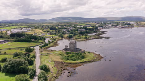 Aerial-Shot-of-Dunguaire-Castle-and-Surrounding-Area-in-County-Galway,-Ireland