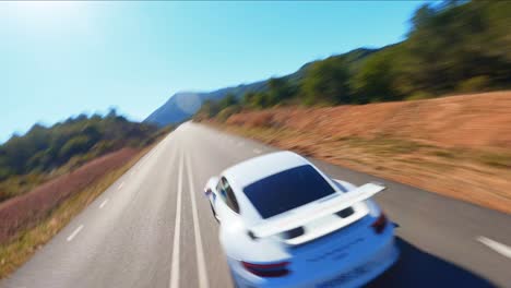 Antena-Escénica-Fpv-Volando-Alrededor-De-Un-Porsche-911-Blanco-A-Lo-Largo-De-Una-Pintoresca-Carretera-De-Montaña