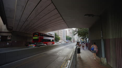 Dynamic-Urban-Pulse:-Life-in-Hong-Kong---Pedestrians-with-Masks,-Traffic-Flowing---4K-Cityscape