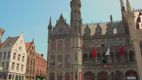 Front-Facade-Of-The-Historium-Building-Stands-Tall-At-Grote-Markt-In-Bruges,-Belgium