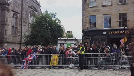 Wide-shot-of-people-waiting-for-the-arrival-of-the-Royal-family-in-Edinburgh