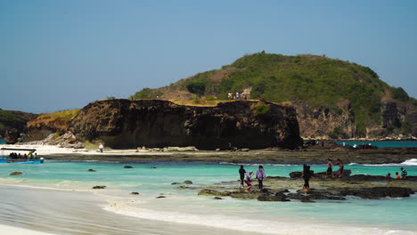 Tourists-at-the-Tanjung-Aan-Beach-on-Lombok-Island,-Indonesia