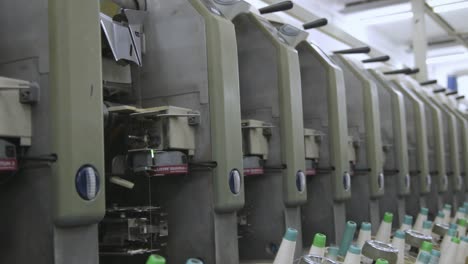 Producing-Cotton-Thread-On-A-Machine-In-A-Spinning-Mill,-Industrial-Machinery