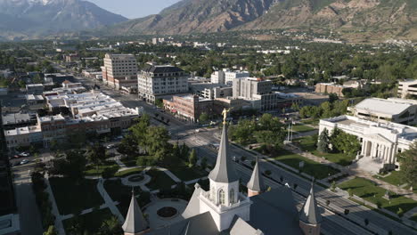 Reverse-aerial-dolly-over-spire-of-LDS-Mormon-Temple-in-Provo,-Utah