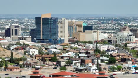 Housing-in-front-of-El-Paso,-Texas-skyline-with-West-Star-building