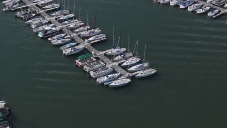 Dillon-Colorado-USA,-Aerial-View-of-Moored-Boats-in-Marina-on-Sunny-Summer-Day,-Revealing-Drone-Shot