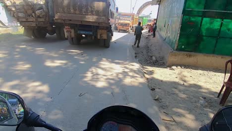 goods-truck-many-waiting-in-traffic-jam-at-border-crossing-from-flat-angle-view-video-is-taken-at-dawki-meghalaya-north-east-india-on-July-06-2023