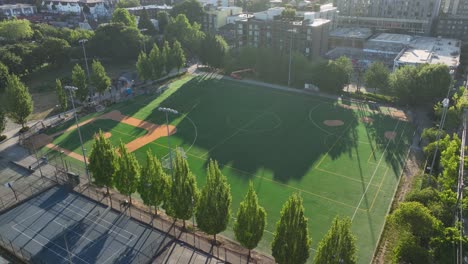 Aerial-view-orbiting-around-Cal-Anderson-Park-in-Seattle-at-sunrise