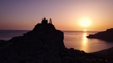 Sunset-on-a-church-on-a-hill-in-Crete-island-of-Greece