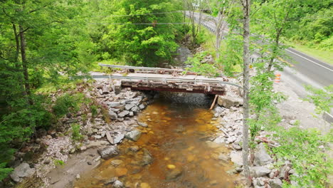 Aerial-Drone-View:-Small-Bridge-Damaged-by-Flood-Waters-in-Plymouth-Notch,-VT