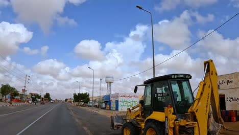 Driving-through-town-in-Tunisia-with-people-selling-smuggled-fuel-from-illegal-petrol-market