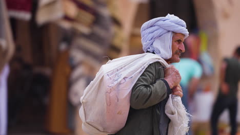 A-Merchant-Algerian-Man-Wearing-Turban-In-The-Old-Town-Of-Ghardaia,-Algeria