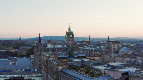 Aerial-shot-rising-over-Edinburgh-at-dusk