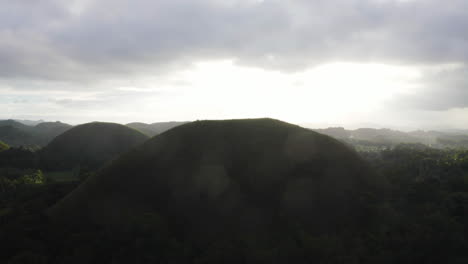 Aerial-flight-over-Chocolate-Hills-in-sunset