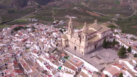 Amazing-view-of-Olvera-Spain-the-white-city-with-mountains-in-the-background,-aerial