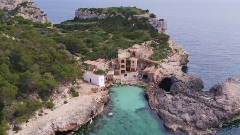 Beautiful-Mallorca-cove-Cala-S´Almonia-from-above-during-day-time,-aerial