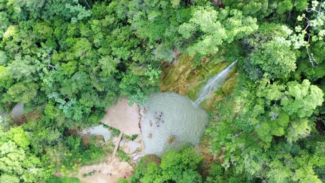 Waterfall-Salto-el-Limon-in-the-Caribbean-tropical-jungle,-aerial-drone-rising