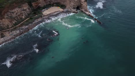 Terranea-Cove-Beach-and-Pacific-Ocean-Waves,-Rancho-Palos-Verdes,-California,-aerial-view