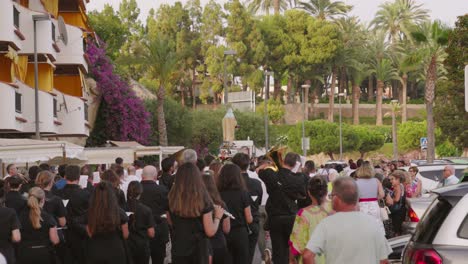 Music-band-in-procession-with-the-Virgen-del-Carmen-in-Villajoyosa,-Alicante,-Spain,-2023