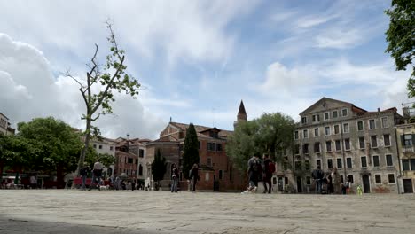 Tourists-Walking-Past-Venice-Piazza