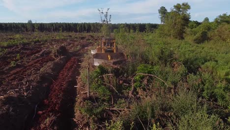 Aerial-Drone-shot-of-Soil-Prepartion-machines-turning-forest-land-into-agriculture-land-of-Posadas-in-Misiones-Argentina