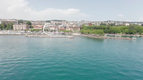 Establishing-aerial-of-the-yacht-harbor-in-Lausanne,-Switzerland