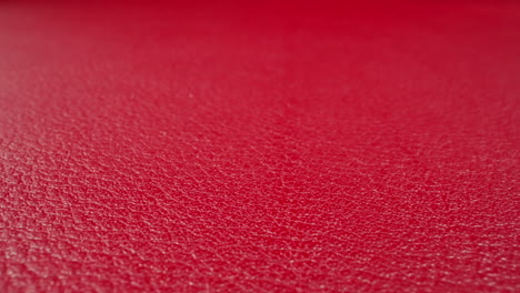 Texture-of-cow-leather-surface-colored-red-as-background