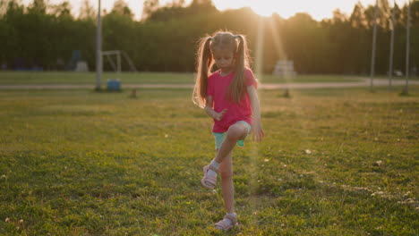 Blonde-little-girl-waves-off-biting-insects-at-stadium