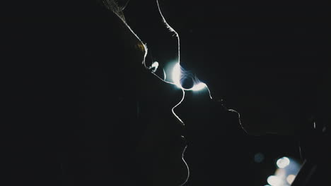 silhouettes-of-amorous-young-couple-looking-at-each-other