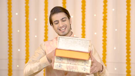 Indian-man-with-sweet-boxes