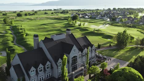 regal-country-club-house-and-golf-course,-utah-lake,-Aerial-reverse-dolly