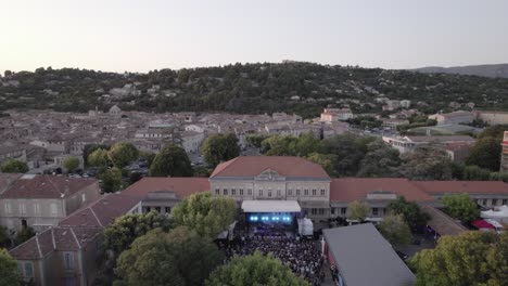 Aerial-view-of-a-Festival-event-"d'Apt"-in-southern-France-during-sunset