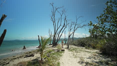 Woman-visiting-tropical-beach-during-summer-in-Costa-Rica,-Cahuita